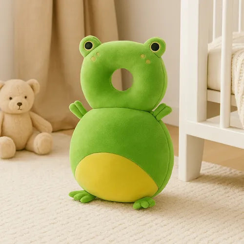 Coussin Anti-chute Bébé - Grenouille disponible sur coussin-deco.fr, mis en situation dans une chambre bébé.