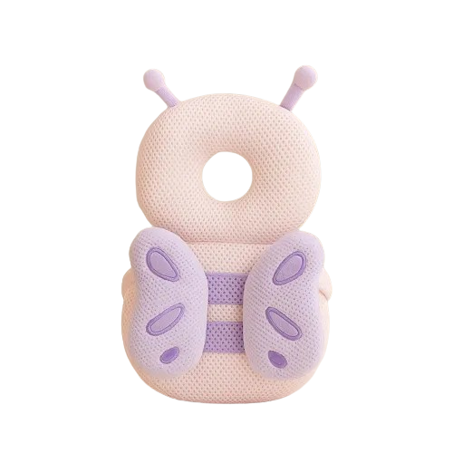 Coussin Anti-chute Bébé - Papillon disponible sur coussin-deco.fr, mis en situation dans une chambre bébé.